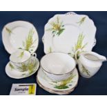 A Royal Stafford Broom pattern collection of tea wares comprising five cups, six saucers, six side