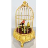 A mid 20th century German double singing bird musical automaton cage, in working order.