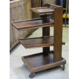 The Compactable serving trolley in oak on four tiers with adjustable shelving