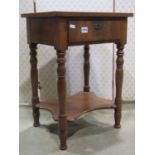 A small 19th century mahogany side table fitted with a frieze drawer with segmented interior
