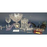 A large quantity of glass items, ranging from glass animals, Cinderella’s slipper, drinking glasses,