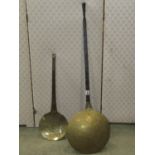 A 19th century brass bed warming pan with pierced cover and steel handle, together with a further