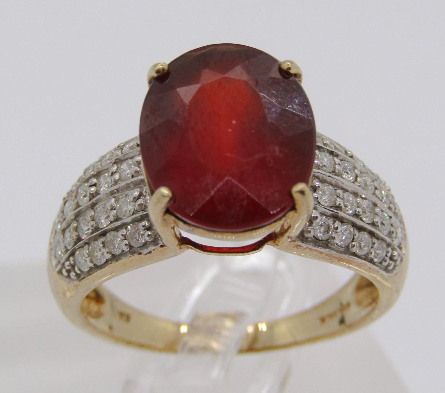 9ct oval garnet and diamond cluster dress ring, size N, 4.5g