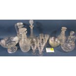 Eight matching 19th century engraved decanters , four at 25cm high and four at 22cm high, a matching