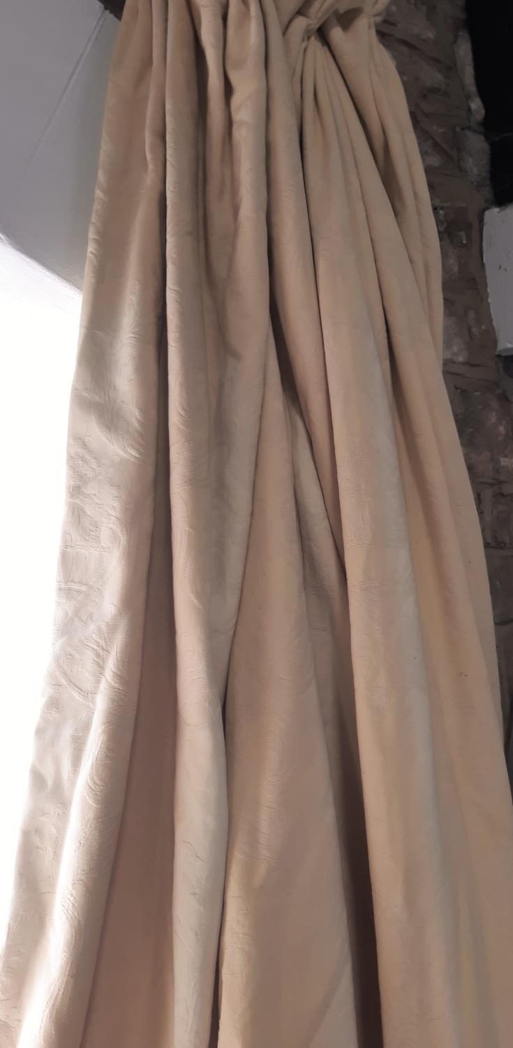 One pair heavyweight curtains in pale gold, lined and thermal lined with triple pleat heading. Sun