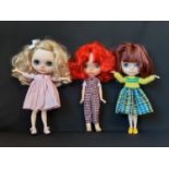 Three dolls in the style of Blythe 'Neo', all customised by 'Dreaming in Dolls'; 2 have colour