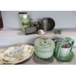 Vintage kitchen ware, including a Moulinex Legumex peeler, a green enamelled Thermos, a green