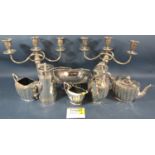 A pair of Georgian style silver plated three branch candelabra 31cm high , a large silver plated