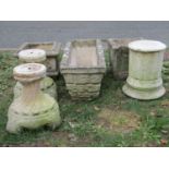 Three weathered cast composition stone planters of various size and design, one with gothic