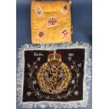 An embroidered mat depicting the badge of the Royal Engineers embroidered 'Palestine 1940' 40x34 (