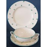 A Susie Cooper part dinner service comprising six dinner plates, various graduated side plates,