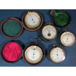 Five pocket barometers (three with original cases, two uncased) by Callaghan, Negretti and Zambra,