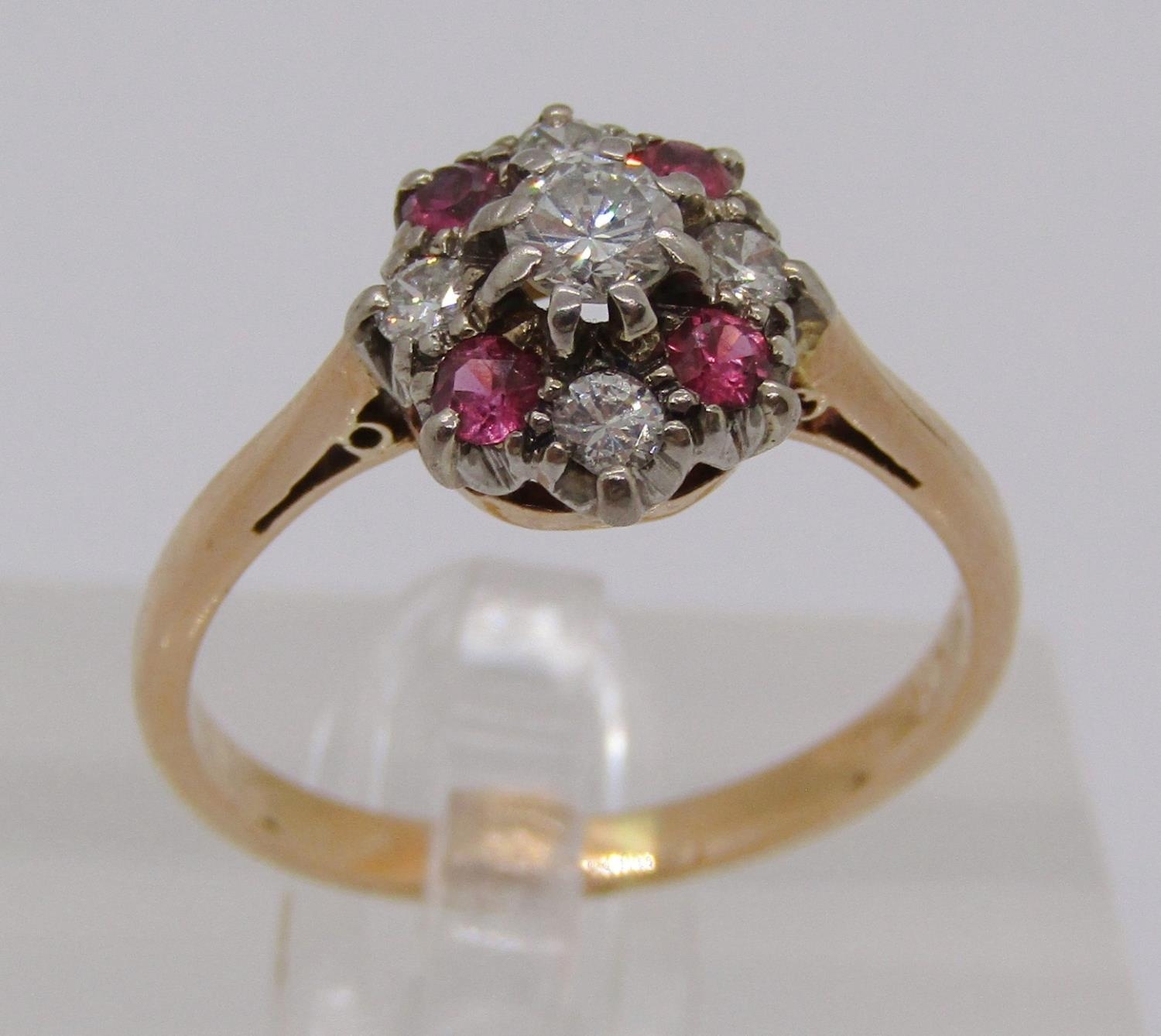 18ct ruby and diamond cluster ring, centre stone 0.15ct approx, size L/M, 3g