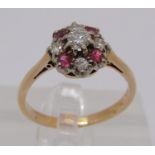 18ct ruby and diamond cluster ring, centre stone 0.15ct approx, size L/M, 3g