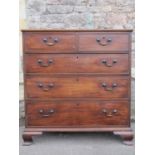 A mid-Georgian period mahogany chest of three long and two short graduated drawer, raised on ogee