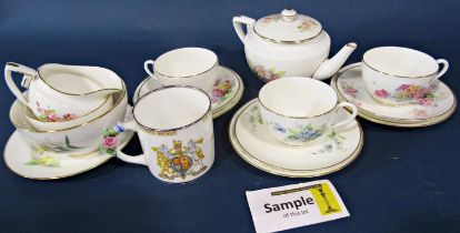 A Royal Worcester part tea service with individual hand painted floral sprays, signed by H