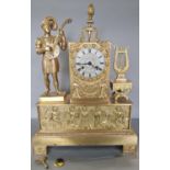 A French Empire period gilt brass mantle clock with silvered dial and two train striking movement,