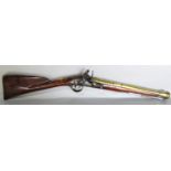 An 18th century Blunderbuss by King of London, the brass barrel with London proofs, walnut stock,