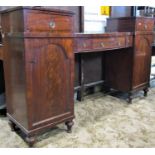 An early 19th century mahogany twin pedestal sideboard fitted with three frieze drawers to central