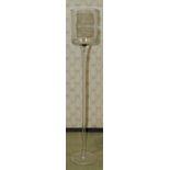 Fourteen modern tall stemmed glass candle holders, 40 cm high, nine further examples 50 cm high