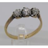 18ct three stone diamond ring, centre stone 0.20ct approx, size M/N, 2.2g