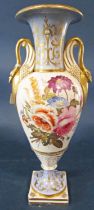 19th century oviform vase with drawn trumpet neck raised on a slender foot and square cut base, with