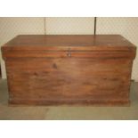 A 19th century stained pine blanket box with hinged lid, exposed dovetail construction, drop iron