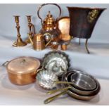 Kitchen copper ware including three graduated vintage frying pans, four jelly/aspic moulds, a lidded