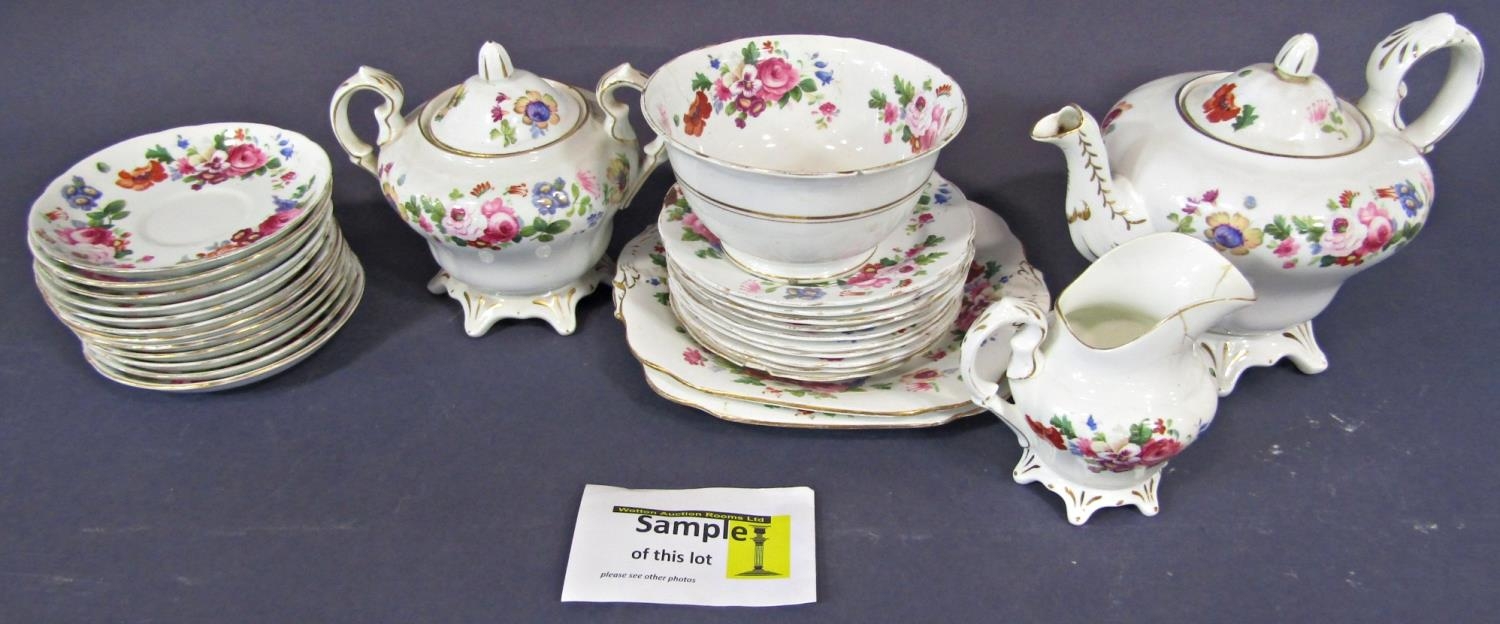 A collection of tea wares with printed floral detail comprising teapot, covered sucrier, milk jug,