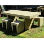 A contemporary Habitat composite mock buff coloured stone effect garden table of rectangular form,