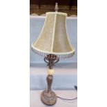 A Neo Classical style table lamp with a silk effect shade with beaded drops on a silver finished