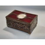 A 19th century jewellery box with quarter red enamelled lid with a central oval miniature of a woman