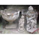 Weathered cast composition stone garden urn with acanthus leaf bowl raised on a loose socle