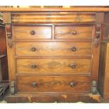 A Victorian mahogany chest of four long and two short drawer, including a cushion moulded drawer set