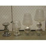 A quantity of boxed contemporary glass candlestands/holders vary size and designs