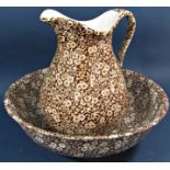 A sepia coloured Calico jug and basin