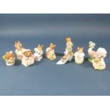 A collection of Beswick Beatrix Potter characters comprising Hunca Munca Sweeping, Tiggy Winkle
