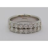 950 platinum double row diamond ring, set with fourteen stones 0.10ct each approx, size O/P, 10.4g