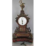 A 19th century scarlet boulle work mantle clock, the brass inlay to a foliate design, enclosing an