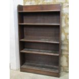 An oak freestanding open bookcase with three adjustable shelves, 92 cm wide x 25 cm deep x 153 cm
