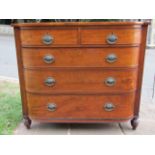 A Regency mahogany chest of three long and two short graduated drawers, with swept sides and