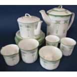 A collection of art nouveau tea wares - Peacock pottery, comprising teapot, two coffee pots, four