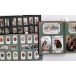 An album containing a quantity of mainly romantic, humorous, sentimental postcards including an