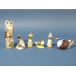 A collection of miniature ceramics of birds comprising an owl, two birds of prey (possibly kestrels)