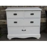 An Edwardian pine dressing chest of two long and two short drawers with later painted finish, 91