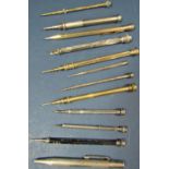 A collection of twelve Victorian and later propelling pencils, three by S Mordan, in silver, gold