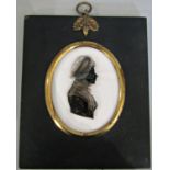 Silhouette portrait of a lady reverse painted on glass (c.1780), 8 x 6.5 cm, framed