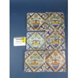 A collection of 40 antique Isnic ceramics tiles, with repeating detail centered around a vase of