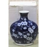Four boxed modern Chinese Aya blue and white moon type vases, 30 cm high