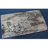 A Chinese silver metal zodiac plaque with flying dragons verso, 9 x 5cm, 4oz approx